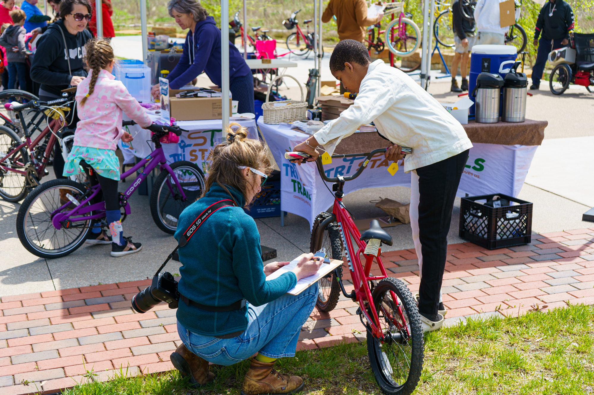 Photo of bike getting tuned up at Earth Day 2023 celebration