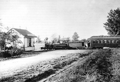 Photo of Cincinnati & Westwood locomotive and passenger train near South Fairmount in 1880