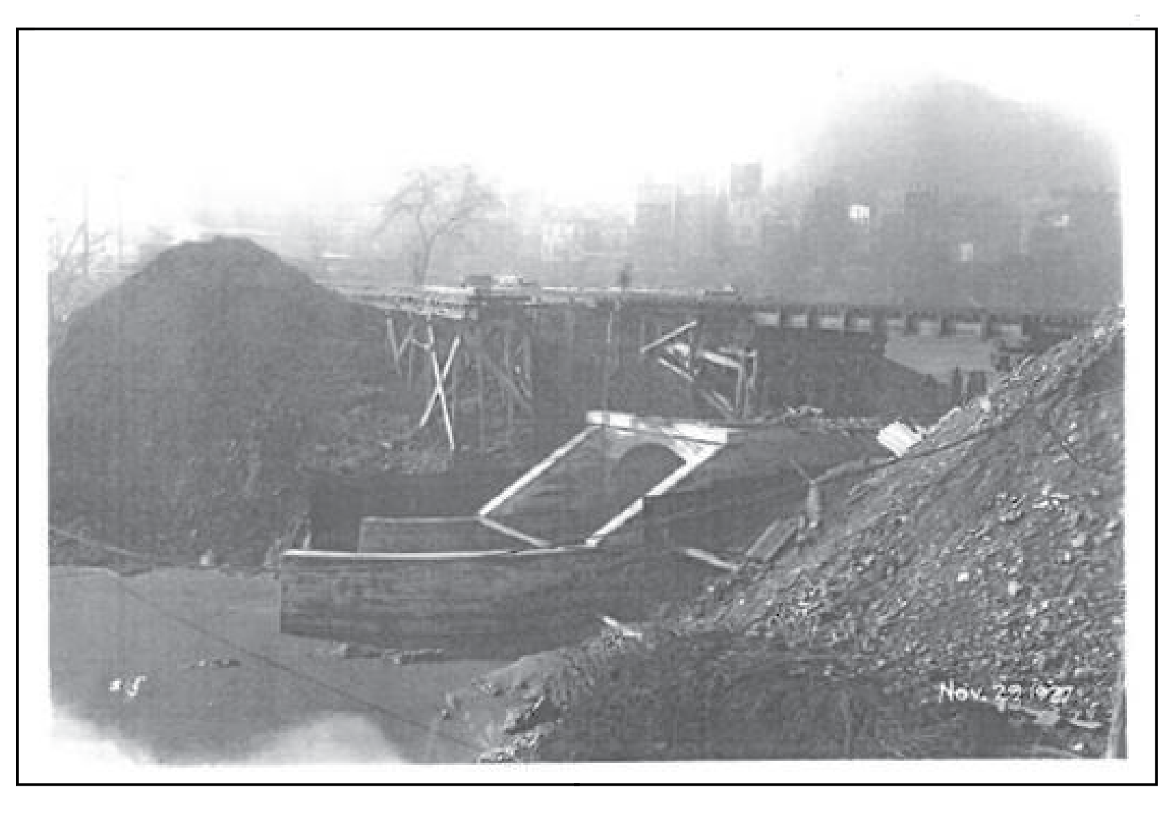 Outfall from the Lick Run sewer into the Mill Creek with Lunkenheimer in background, 1927