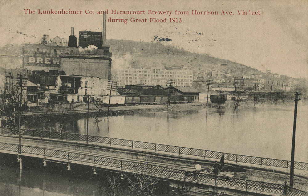 Postcard showing Herancourt Brewery with Lunkenheimer in the background during the 1913 flood